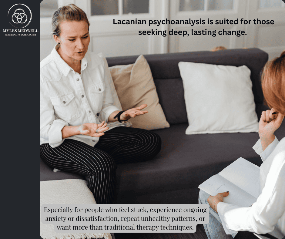 Two women in a therapy session, one speaking expressively while seated on a sofa, similar to a session at Myles Medwell Psychology in Richmond, Melbourne